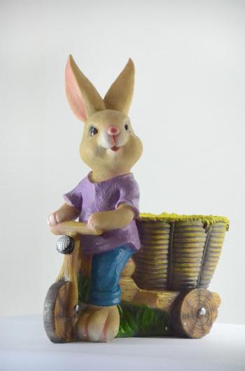 Lapin de Pâques en bicyclette